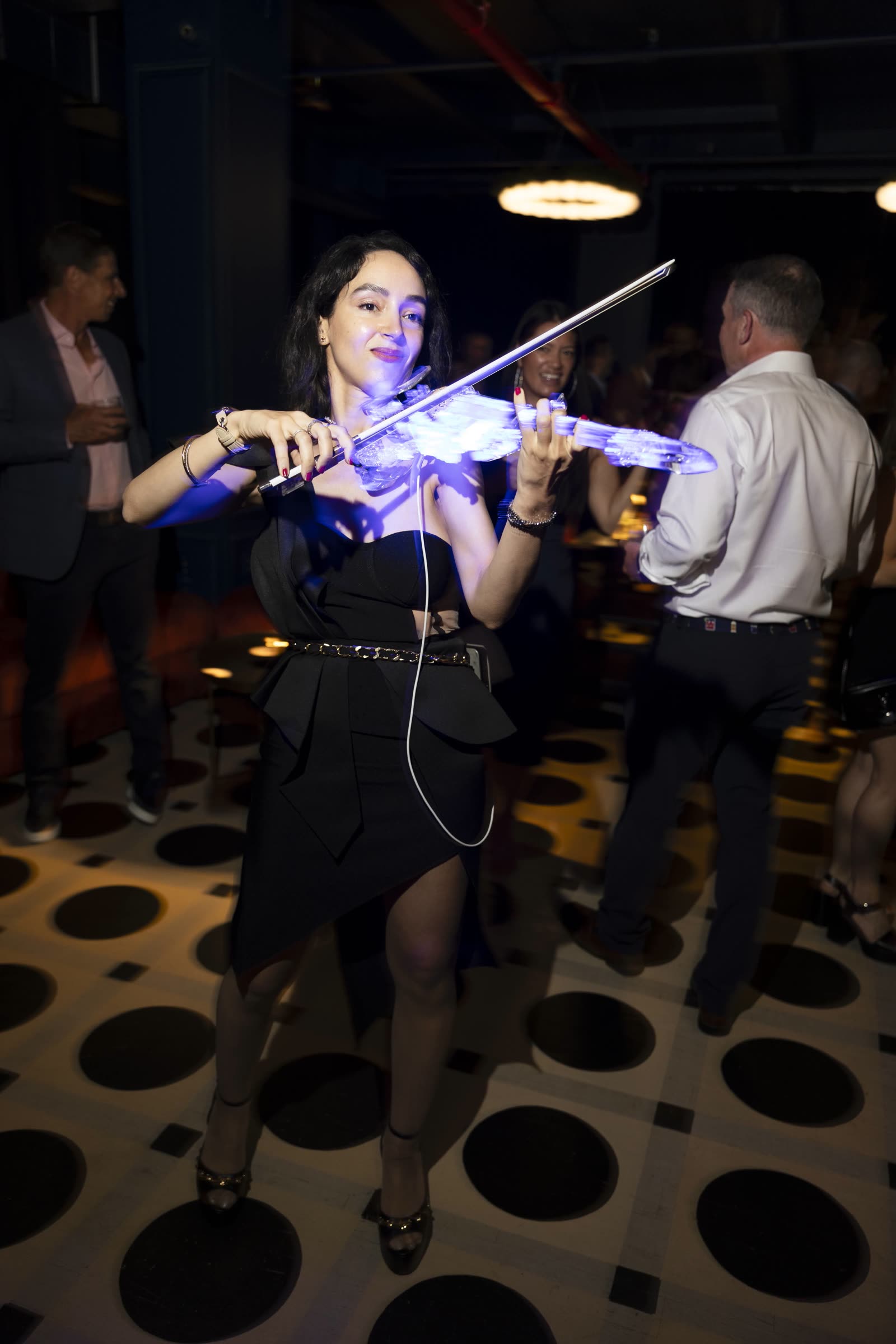 The transparent violin glowing blue